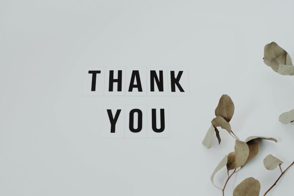 A minimalist thank you note with eucalyptus leaves, perfect for expressing gratitude.